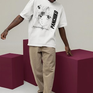 White t-shirt front print preview in a lifestyle setting, featuring panchiko deathmetal album on the main chest placement.