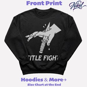 Front-facing white unisex sweatshirt mockup with realistic folds and title fight printed on the chest area.