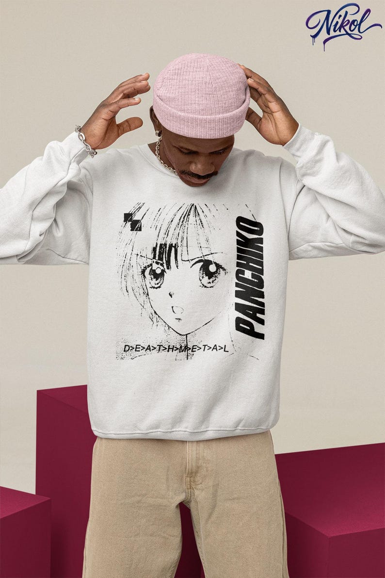 Close-up lifestyle mockup of a white sweatshirt with panchiko deathmetal album front print, model adjusting beanie.
