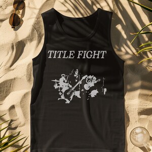 Front print lifestyle image of a white t-shirt, showcasing Title Fight with natural fabric drape.