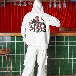 White hoodie back view product photo on a model, showing title fight centered on the back.