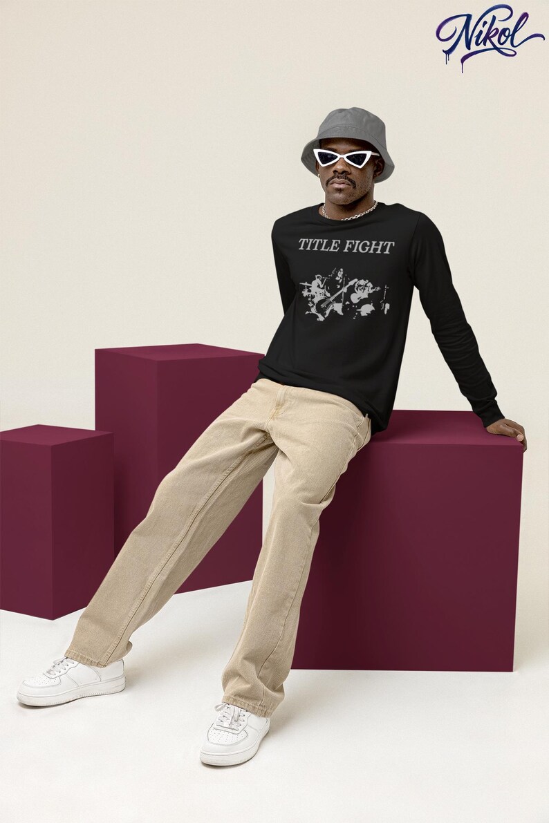 E-commerce lifestyle mockup of a white t-shirt on a model, front print featuring Title Fight.