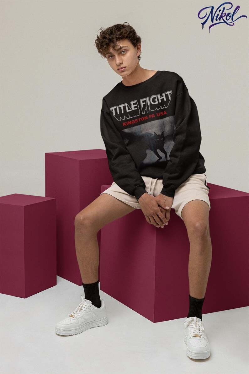 White long-sleeve shirt front print preview in a lifestyle studio setup, featuring Title Fight on the torso.
