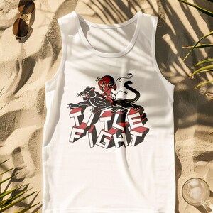 Lifestyle-style flat lay of a white tank top, showcasing Title Fight centered on the front print zone.