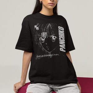 Studio lifestyle shot of a white pullover sweatshirt with Panchiko deathmetal album centered on the front.