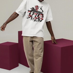 Studio lifestyle shot of a white t-shirt with title fight centered on the front print area.