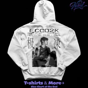 Puede incluir: Sudadera con capucha blanca con un gráfico en blanco y negro de una persona y texto. El texto incluye "ECCO2K", "LIVE + DJ SET" y "2019/11/30, 23:00 - 04:00". El texto inferior dice "T-shirts & More".
