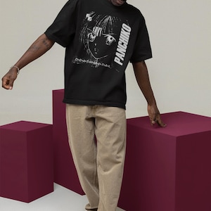 Model wearing a white crewneck t-shirt outside, highlighting Panchiko deathmetal album on the front print zone.