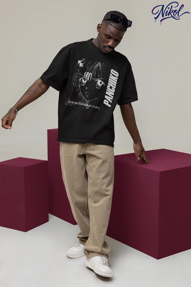 Model wearing a white crewneck t-shirt outside, highlighting Panchiko deathmetal album on the front print zone.