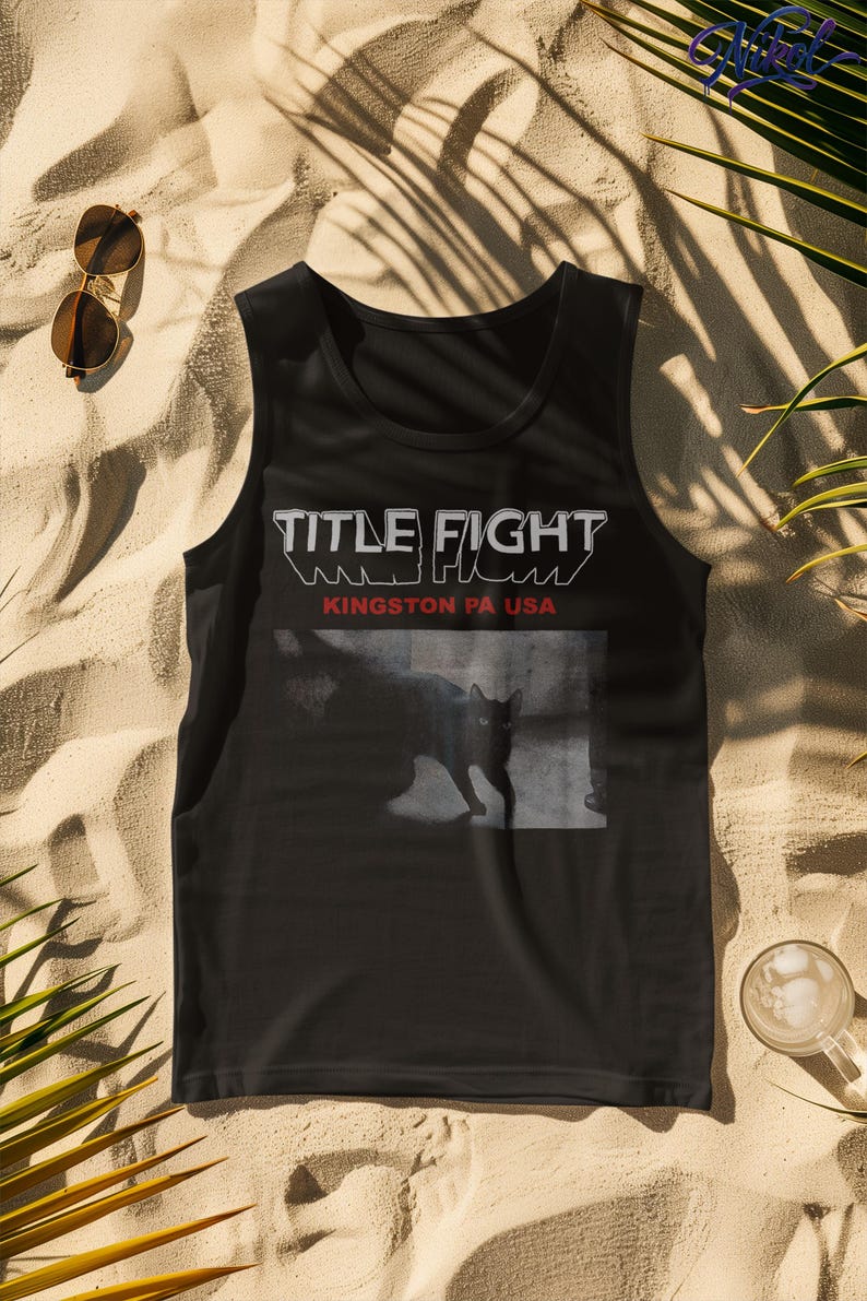 Full-body studio shot of a model in a white tee, front print featuring Title Fight on the chest area.