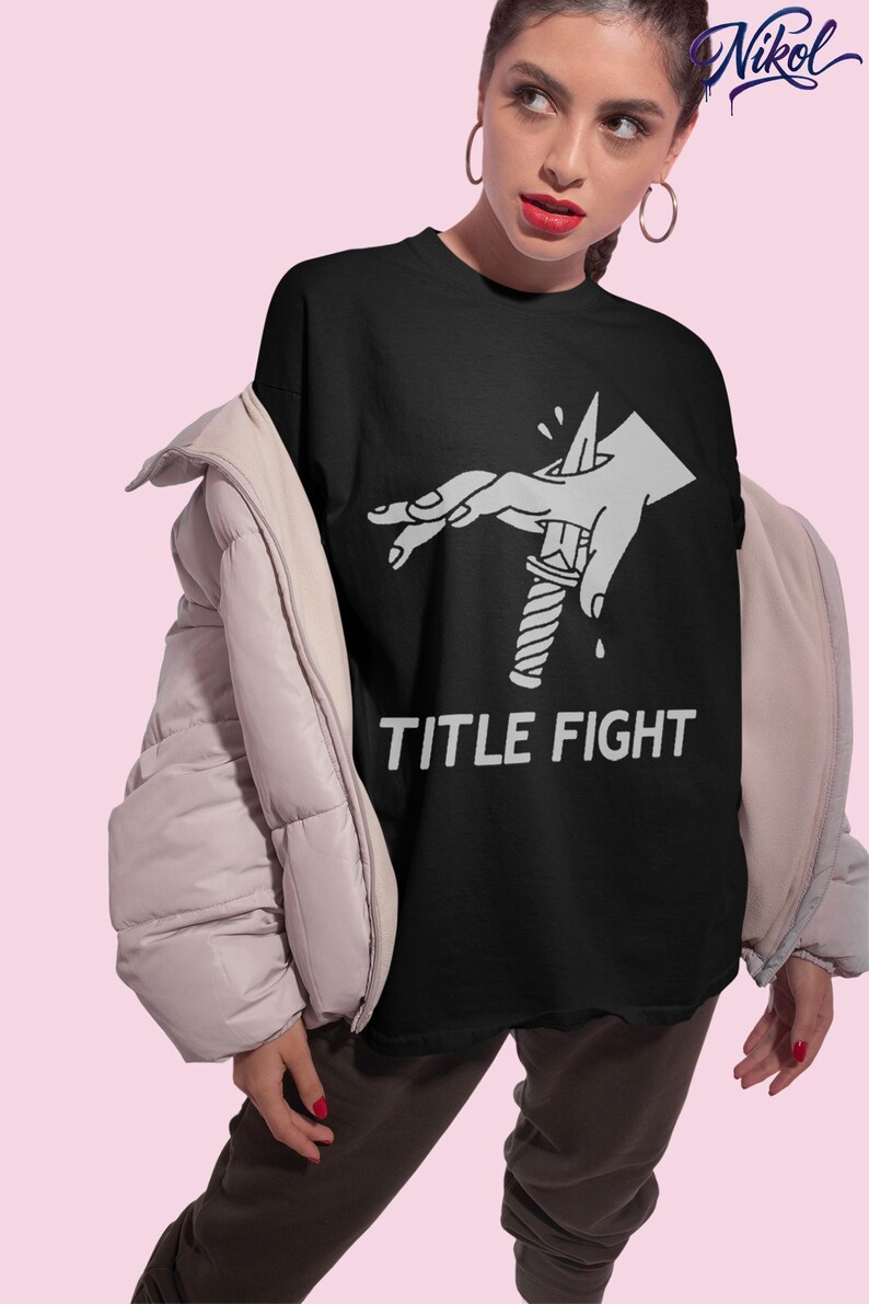 Front print lifestyle mockup of a white oversized t-shirt, title fight centered on the chest area.