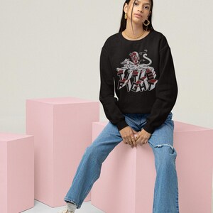 Model wearing a white long-sleeve shirt, front design area customized with title fight.