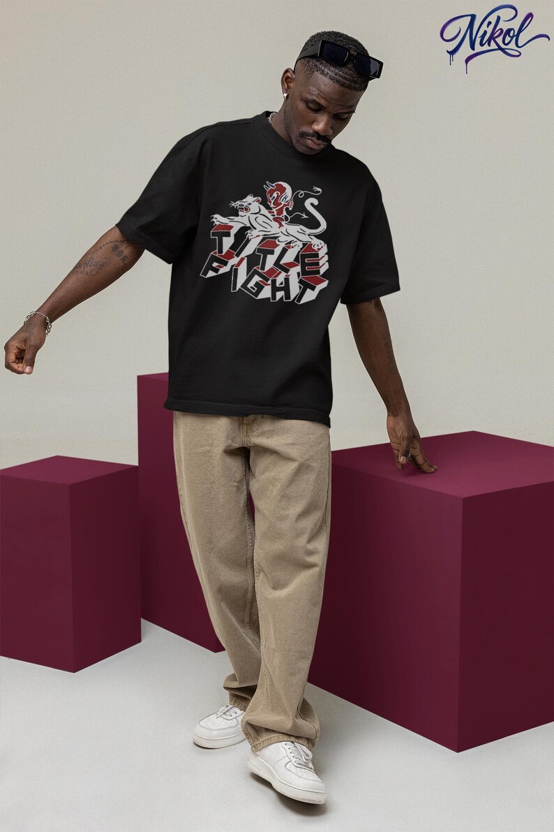 White t-shirt lifestyle mockup in an outdoor setting, front print displayed as title fight.