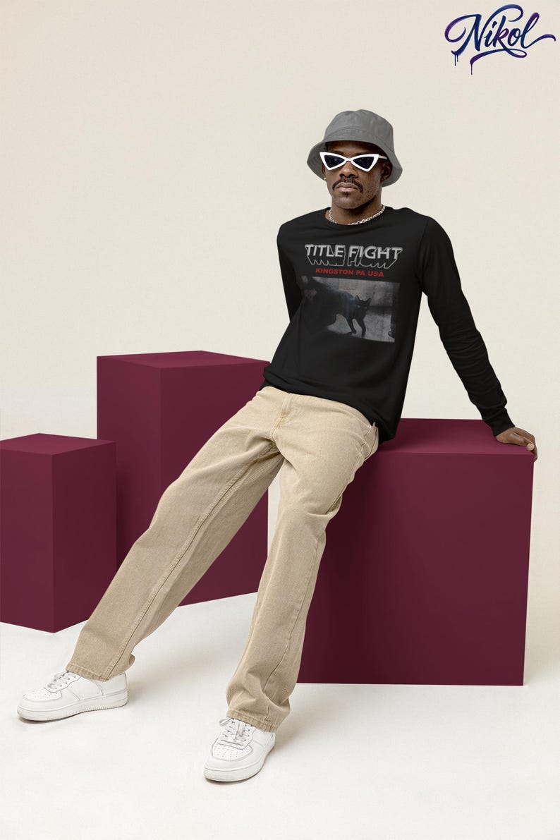 Studio lifestyle shot of a white t-shirt, front print area customized with Title Fight.