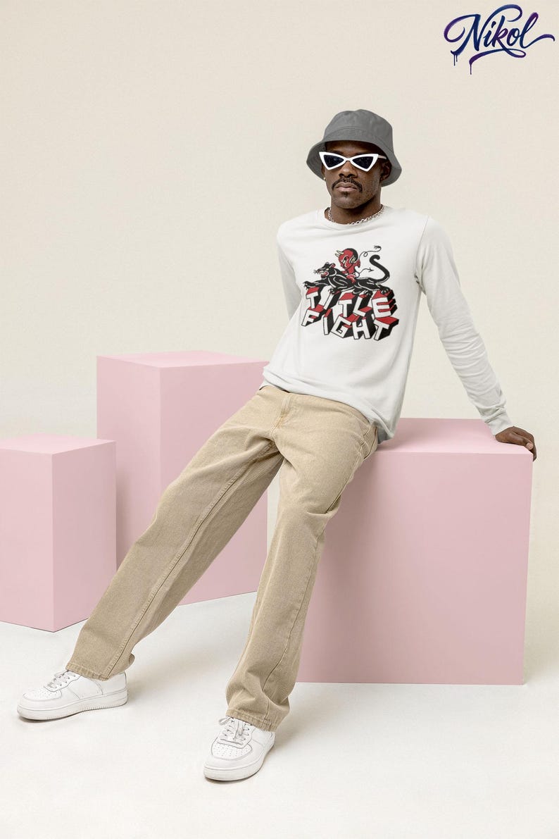 White long-sleeve t-shirt worn by a model, front print display showing Title Fight.