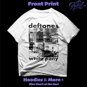May include: White t-shirt featuring the band name "deftones" in black, with a collage of black and white images and the text "white pony". The shirt also has the text "Hoodies & More" and "Size Chart at the End".