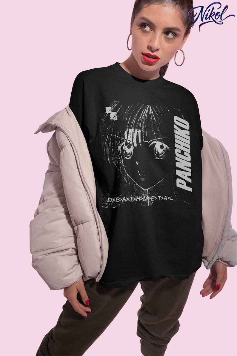 Lifestyle photo of a model wearing an oversized white t-shirt with Panchiko deathmetal album printed on the front.