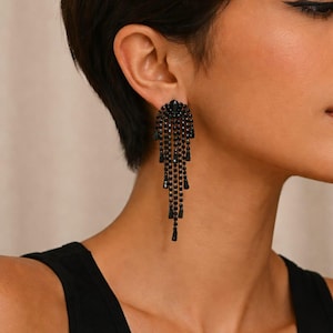 Black fringe drop earrings, glass, long, chic jewelry, elegant evening wear, modern glamorous style for women.