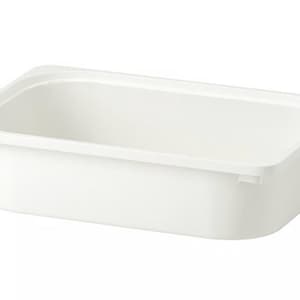 May include: A rectangular, off-white plastic storage bin. The bin has a slightly rounded shape with a flat rim around the top edge. The sides are smooth and the overall design is simple and functional.