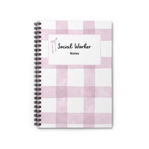 May include: A white ceramic mug with a black handle and the text "But First, Coffee" in a bold, black font. The mug is set against a blurred background, suggesting a cozy setting.