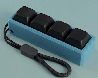 Llavero con teclado mecánico de 4 teclas y juguete antiestrés