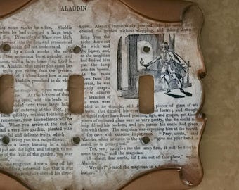 Placa para interruptor de luz con diseño de libro de biblioteca de Aladino (Decoupage)