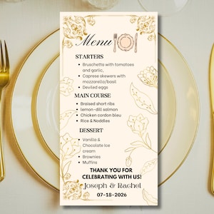 May include: A rectangular menu card with a cream background and gold floral accents. The menu lists starters, main courses, and desserts. The text reads "Menu", "Thank you for celebrating with us!" and the names "Joseph & Rachel" with the date "07-18-2026".