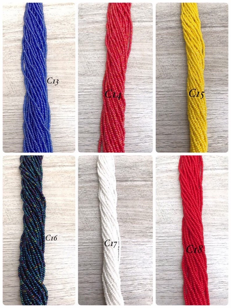 May include: Assortment of seed beads in various colours, including blue, red, yellow, white, and black. The beads are arranged in rows and labelled with numbers C13 through C18.