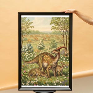 May include: A framed print depicting a family of Parasaurolophus dinosaurs in a meadow filled with flowers. The artwork uses a warm colour palette with green, brown, and yellow tones. The background shows a field of dinosaurs, framed in a black frame.
