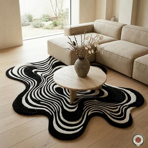 Dywan Op Art, ręcznie tuftowany wełniany, dywan z iluzją optyczną, czarno-biały, falisty dywan, nieregularny kształt, graficzny, wyrazisty dywan