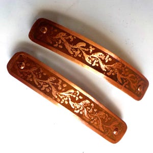 Small etched copper hair barrettes. Pair of hand etched metal hair barrettes with tiny flowering vine pattern on antiqued copper.