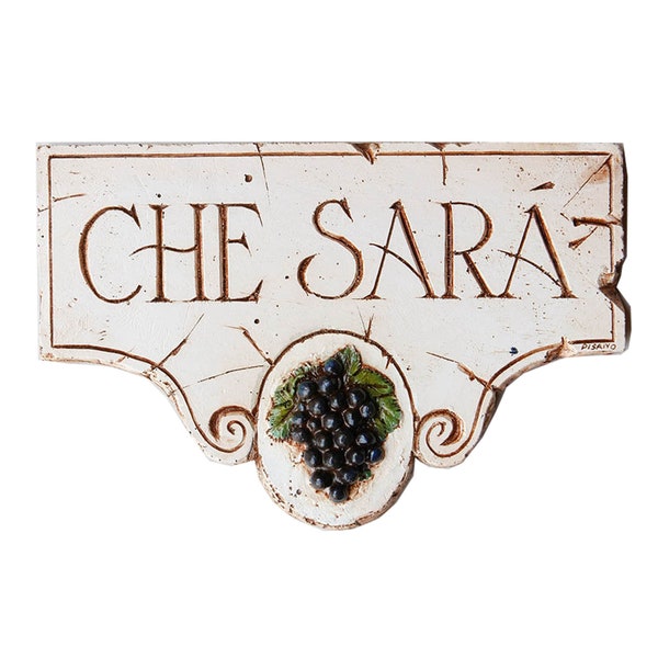 Italian wall plaque with the words What Will Be