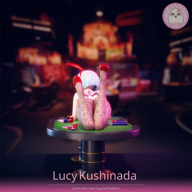 May include: A figurine of a character with short white hair, wearing a white bodysuit, red high heels, and patterned stockings, lying on a green poker table with scattered chips. The text Lucy Kushinada is printed at the bottom of the image.