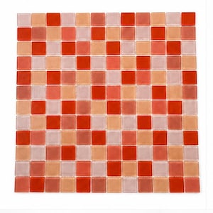 May include: A square mosaic tile sheet featuring a grid of small, individual glass tiles in varying shades of vibrant red, soft peach, and pale pink. The tiles are arranged in a uniform pattern, creating a multi-tonal surface with a smooth finish.