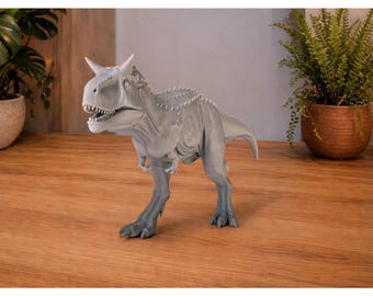 Carnotaurus-Figur zum Bemalen – grauer Dinosaurier mit Hörnern, 13 cm hoch