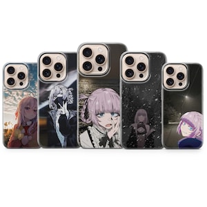 May include: A collection of five phone cases featuring anime-style illustrations. Each case showcases a different character design with varying backgrounds, including sunsets, cityscapes, and snowy scenes. The cases are clear with black camera surrounds.