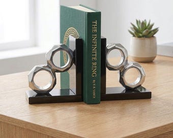 Moderne geometrische Buchstützen in Ringform aus Silber, zeitgenössische schwarze Regaldekoration