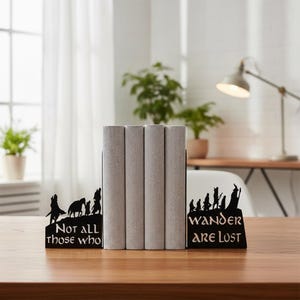 May include: A set of three ceramic mugs with a speckled, matte finish. The mugs are in shades of cream, light gray, and dark gray. Each mug has a simple, minimalist design, perfect for coffee or tea.