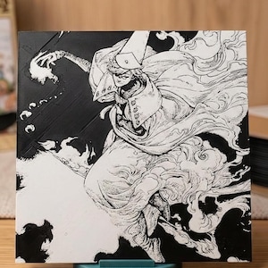 May include: A black and white illustration of a character in a flowing cloak and hat, set against a textured background. The artwork features dynamic lines and a dramatic pose, creating a sense of movement and fantasy. The image is displayed on a square canvas.