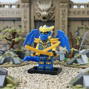 May include: A set of three ceramic mugs with a speckled, matte finish. The mugs are in shades of cream, light gray, and dark gray. Each mug has a simple, minimalist design, perfect for coffee or tea.