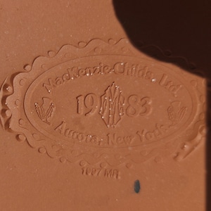 May include: A set of three ceramic mugs with a speckled, matte finish. The mugs are in shades of cream, light gray, and dark gray. Each mug has a simple, minimalist design, perfect for coffee or tea.