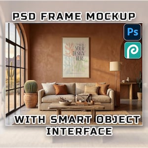 May include: Interior scene with a framed poster mockup on a brown wall. A beige sofa with throw pillows and a wooden coffee table are in front of the poster. A large window with a view of a desert landscape is on the left. The text "PSD FRAME MOCKUP" and "WITH SMART OBJECT INTERFACE" are displayed.