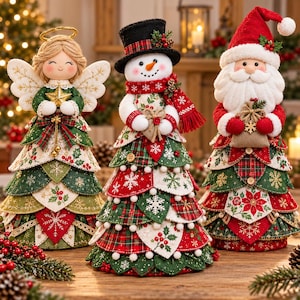 May include: Three fabric Christmas figurines standing side by side. On the left, an angel with a gold halo and wings. In the centre, a snowman wearing a black top hat and red scarf. On the right, a Santa Claus with a red hat and white beard.