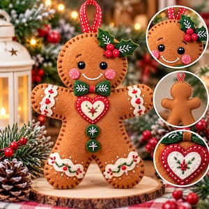 Op de afbeelding: Een bruine vilt kerstversiering in de vorm van een peperkoekmannetje met een rood-wit hart, een groene vlinderdas, twee groene knopen en wit borduurwerk. De hanger is voorzien van een rood lintje en decoratieve hulstblaadjes.