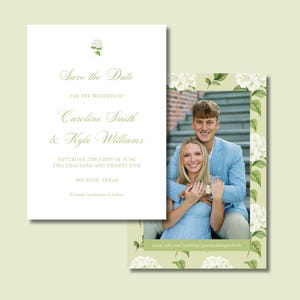 May include: Wedding invitation suite featuring a 'Save the Date' card and a photo card. The 'Save the Date' card has elegant script with the names Caroline Smith & Kyle Williams, date, and location. The photo card has a couple and floral border.