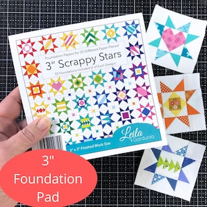 May include: A package of "3" Scrappy Stars" foundation papers for paper piecing, featuring colorful star designs. Includes 50 foundations, each 3" x 3" when finished. Several finished star blocks are displayed alongside the package.