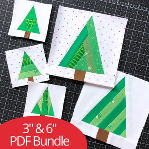 Può includere: Cinque blocchi di tessuto per trapuntatura con disegni di alberi di Natale verdi e tronchi marroni su sfondo bianco, alcuni con pois rossi. Il testo 3" & 6" PDF Bundle è visibile su un tappetino da taglio nero.