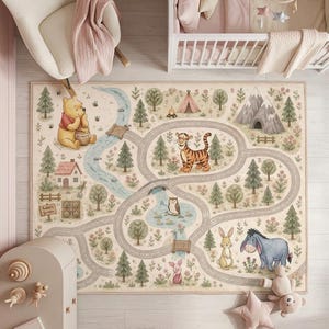 May include: A rectangular area rug featuring a printed map of the Hundred Acre Wood with illustrations of Winnie the Pooh, Tigger, Piglet, Eeyore, and Rabbit. The design includes a winding gray road, a blue river, green trees, and mountains.
