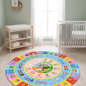 May include: A round educational area rug featuring a colorful alphabet border with illustrations, a central tree graphic, and concentric rings displaying numbers one through twelve, months of the year, and seasonal labels in a bright, multi-colored design.