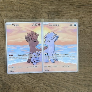 Alolan Vulpix and Vulpix connecting sunset pokemon cards